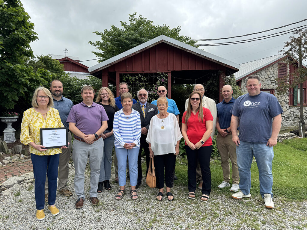 The Casey Rotary Club celebrated its 100th Anniversary on June 17, 2025, during the weekly meeting at Richards Farm. District Governor Mike Martin of Mattoon joined the group to present a certificate to President Marcy Mumford. The actual Charter Anniversary date was January 26, 1925. Present at Tuesday’s luncheon were (front, l to r) Marcy Mumford, Shane Todd, Sharon Durham, Joyce Shore, Megan Peavler, and Brian Hancock; (back) Chris Overbeck, Wendy Navel, Kurt Squires, Jay Markwell, Mike Martin, Gary Shore, and Aaron Stinson. Not present were Christopher Snedeker and John Murphy. —photo by Chuck Ayres.